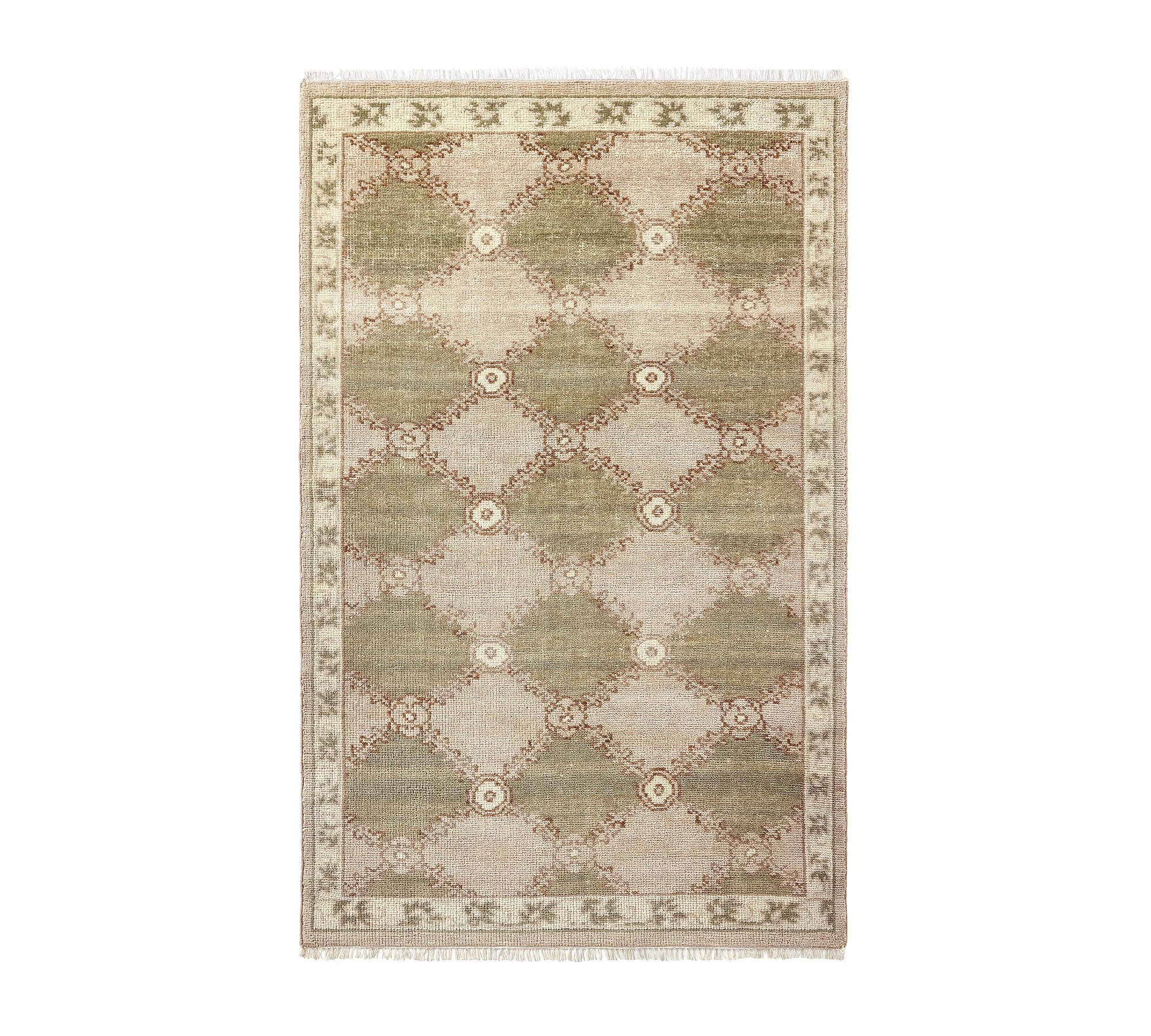 Decorative rug with geometric pattern on a white background